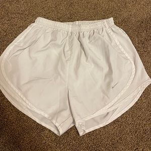 White Nike shorts
